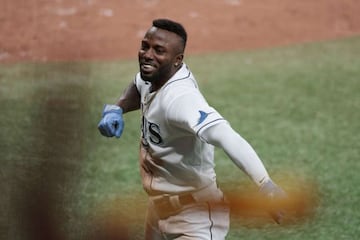 ST PETERSBURG, FLORIDA - OCTOBER 07: Randy Arozarena #56 of the Tampa Bay Rays celebrates after stealing home in the seventh inning against the Boston Red Sox during Game 1 of the American League Division Series at Tropicana Field on October 07, 2021 in S